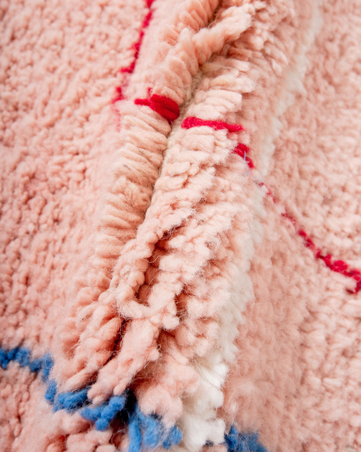 Modern, designer, handcrafted Berber rug from Morocco. Beniourain carpet with beautiful colours and patterns and fluffy wool texture.